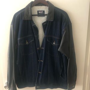 Blue denim jacket with leather sleeves and collar